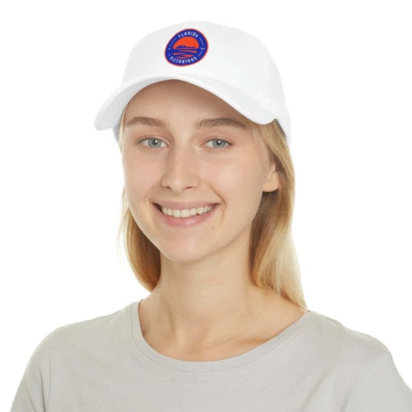 Woman wearing white Florida Victorious patch hat